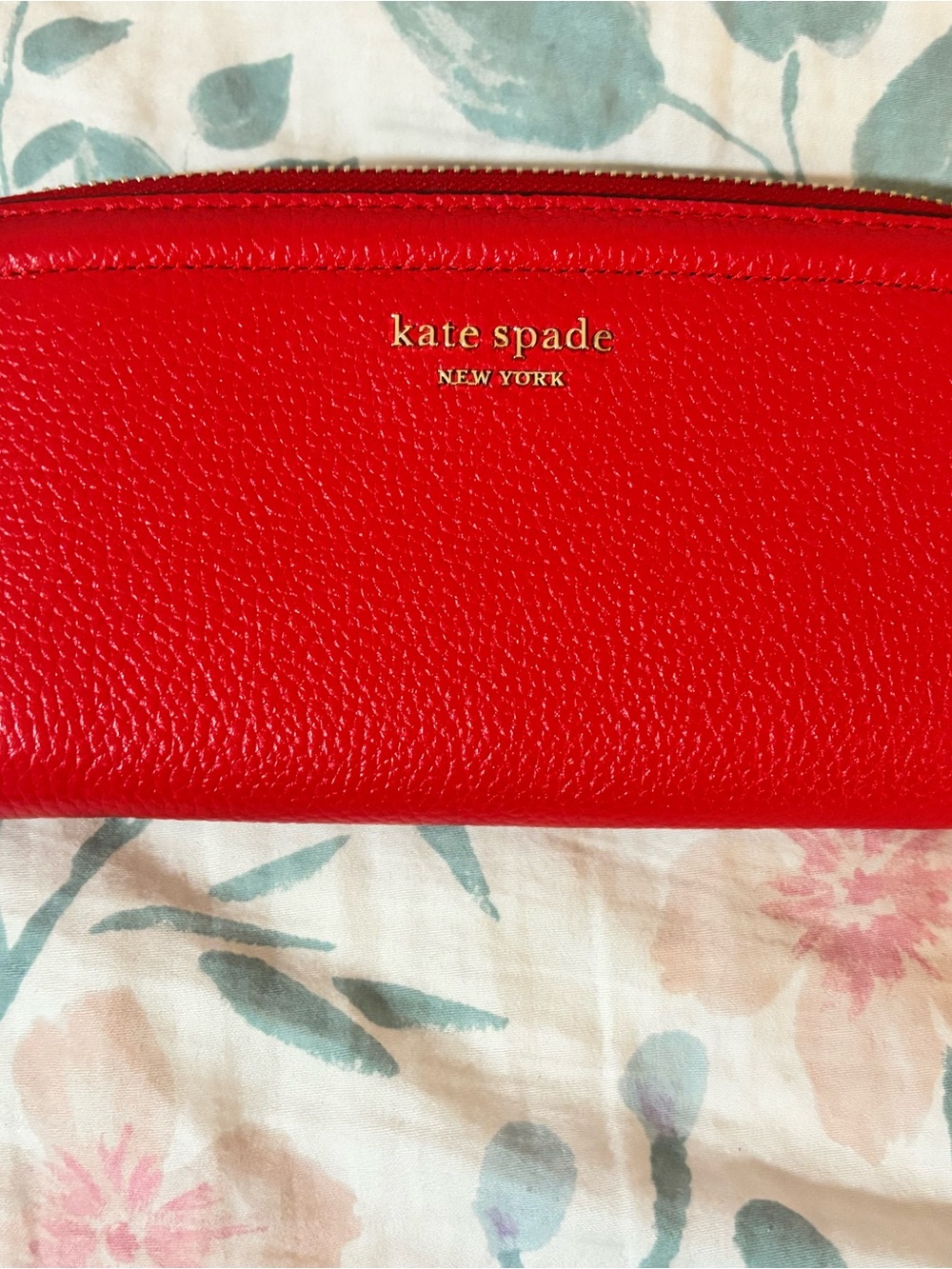 kate spade red pebbled leather long zip wallet with gold logo